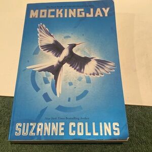 “Mocking Jay,” the third book of the Hunger Games. Paperback